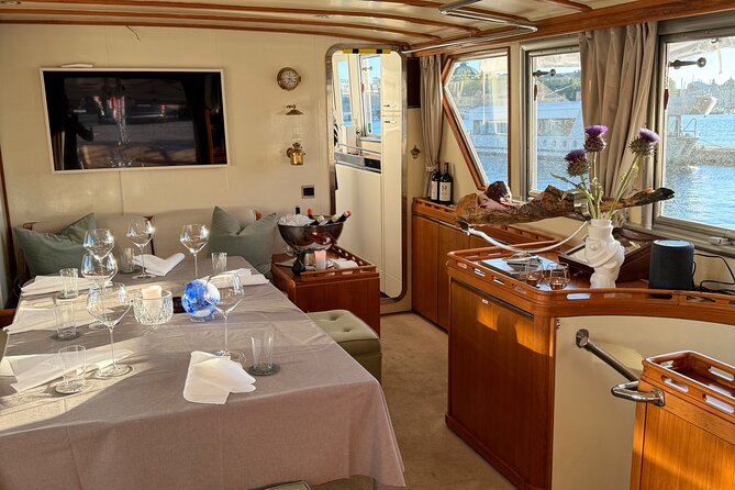Exclusive Yacht Tour of Stockholm: sunset, dinner, lunch, cruise - Skeppsholmen and Djurgården: Museums, Green Space, and a Fun-Fair Look