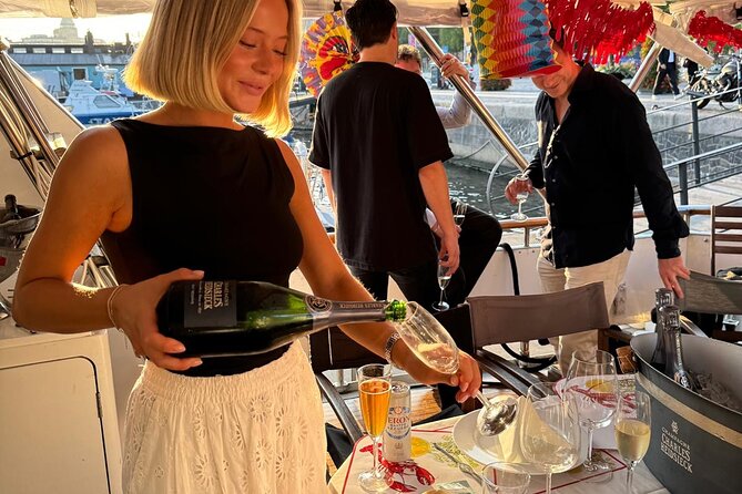 Exclusive Yacht Tour of Stockholm: sunset, dinner, lunch, cruise - Grand Hotel, Nationalmuseum Shoreline, and the Stockholm “Promenade” Feel