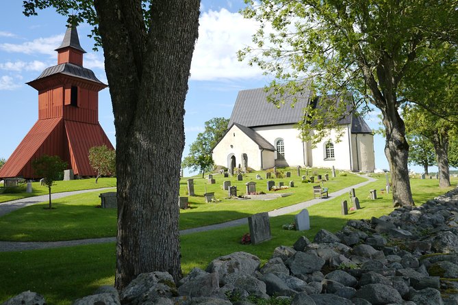 Private Tour: Swedish History Day Trip to World Heritage Candidate Markim-Orkesta from Stockholm - Lindholmen and Orkesta kyrka: two church-linked views of Viking power