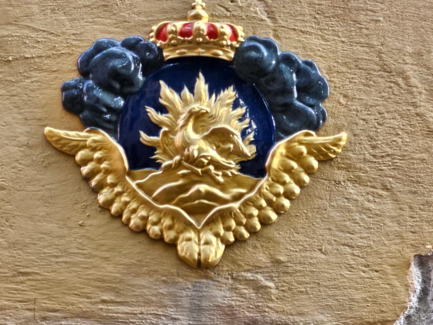 Stockholm: Old Town Walking Tour, stories and secrets - Iron Boy, the Dragon statue, and the fun side of Old Town
