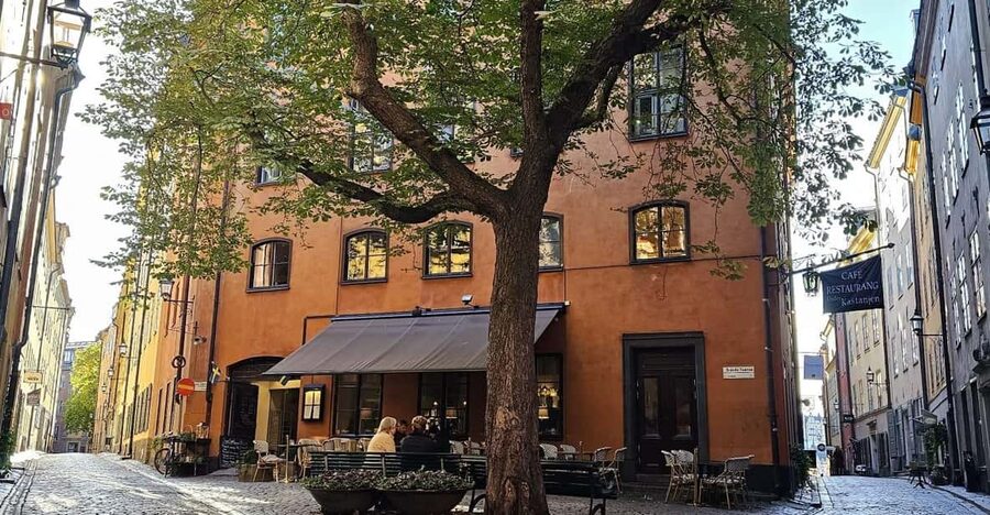 Stockholm: Old Town Walking Tour, stories and secrets - Runestone + Stortorget: the “this is old” moment lands early
