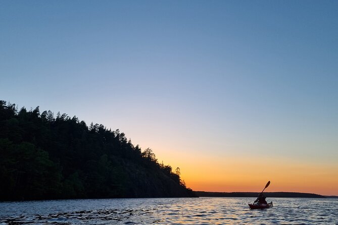 Sunset kayak tour with fika on Stockholms lakeside - Your Guide and the Small-Group Advantage (Simas + Max 8)
